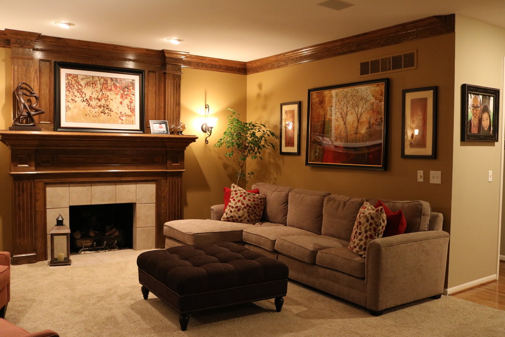 Design ideas for a mid-sized traditional open concept living room in Kansas City with brown walls, carpet, a standard fireplace, a tile fireplace surround and a freestanding tv.