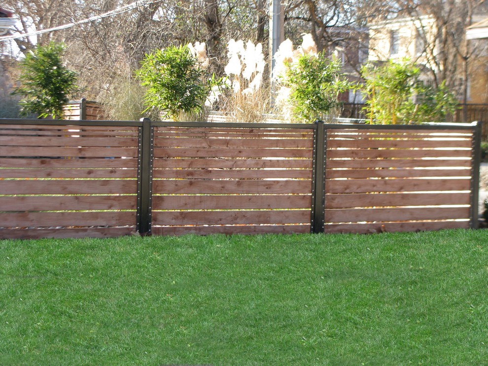 Photo of a mid-sized rustic full sun backyard formal garden in Chicago.