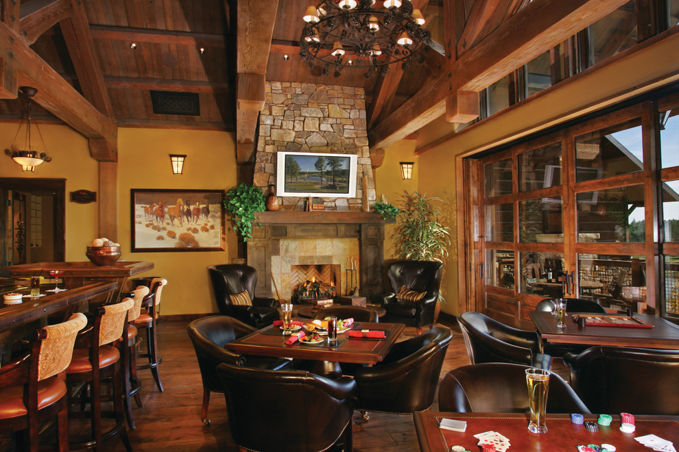 Example of a mountain style home design design in Phoenix