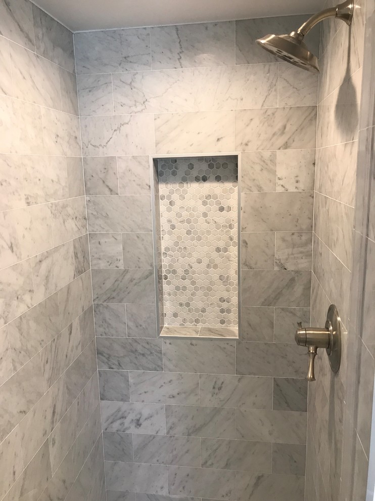 Design ideas for a mid-sized modern master bathroom in Los Angeles with shaker cabinets, white cabinets, a corner shower, a one-piece toilet, white tile, white walls, painted wood floors, a drop-in sink, granite benchtops, grey floor, a sliding shower screen and multi-coloured benchtops.