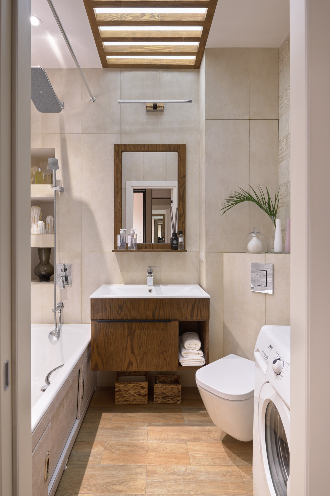 Inspiration for a mid-sized scandinavian master bathroom in Moscow with flat-panel cabinets, medium wood cabinets, an undermount tub, beige tile, ceramic tile, beige walls, ceramic floors, brown floor, white benchtops, a single vanity and a floating vanity.