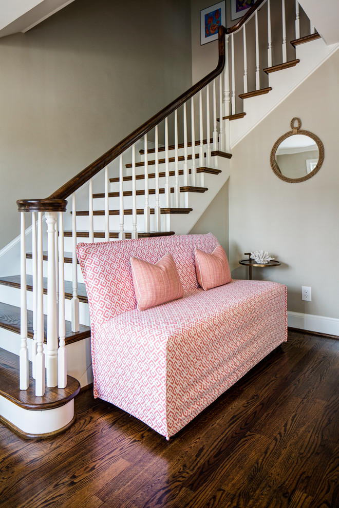 Example of a transitional dark wood floor entryway design