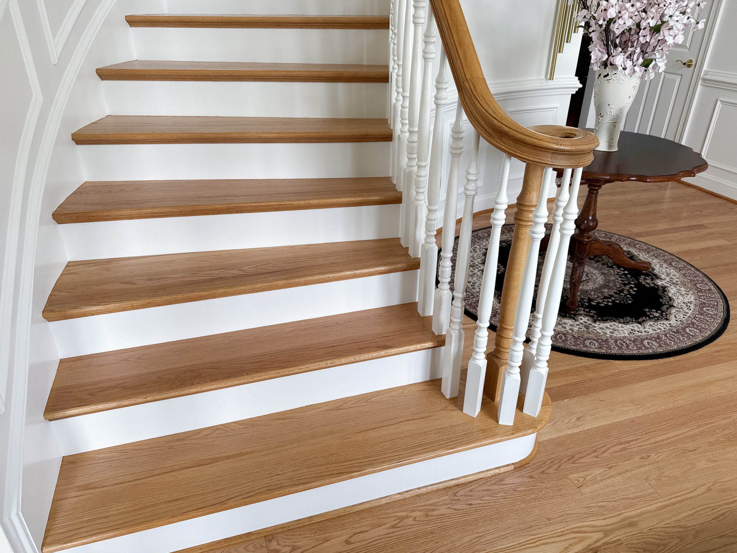 Project #161 | Curved Red Oak Foyer Staircase, 26 Years Later