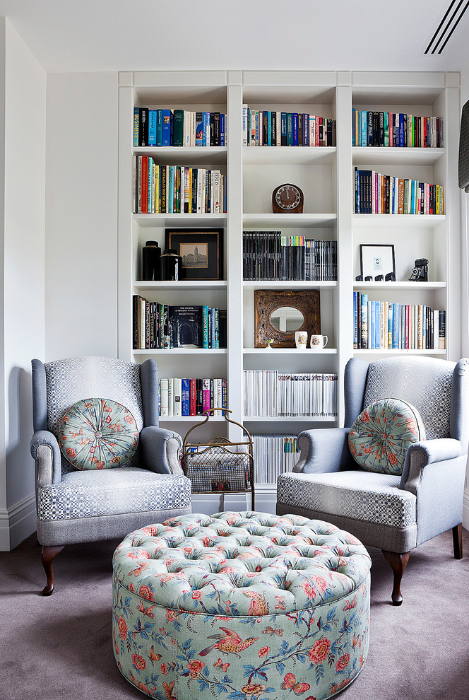 Design ideas for a small contemporary family room in Melbourne with a library, white walls and carpet.