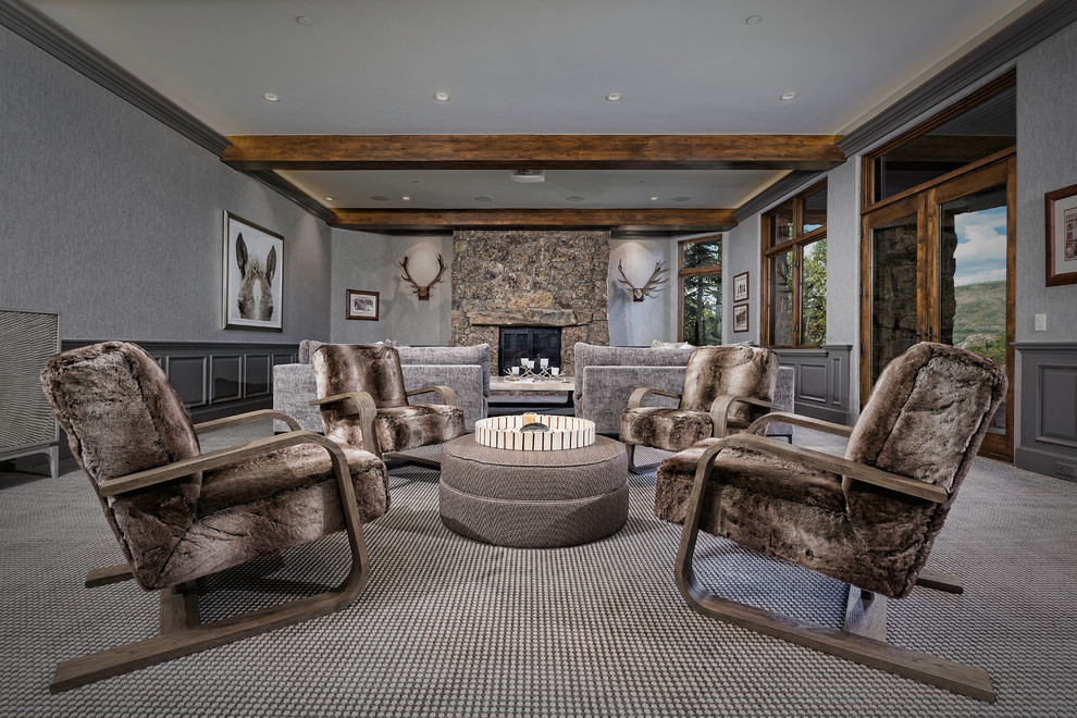 Inspiration for a large country open concept family room in Denver with grey walls, carpet, a standard fireplace, a stone fireplace surround, no tv and multi-coloured floor.