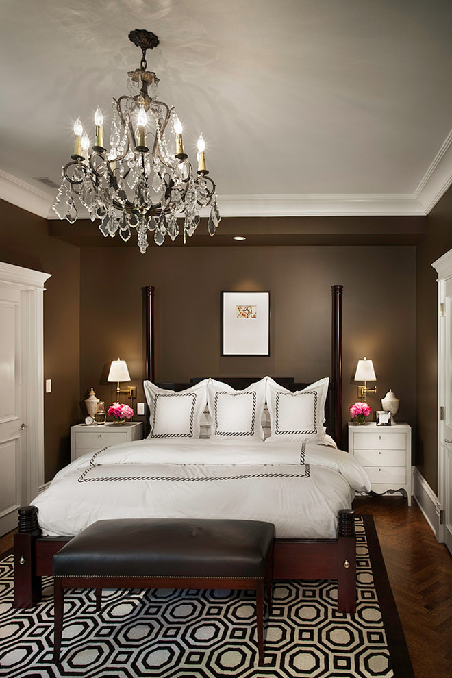 Photo of a traditional bedroom in Chicago with brown walls and dark hardwood floors.