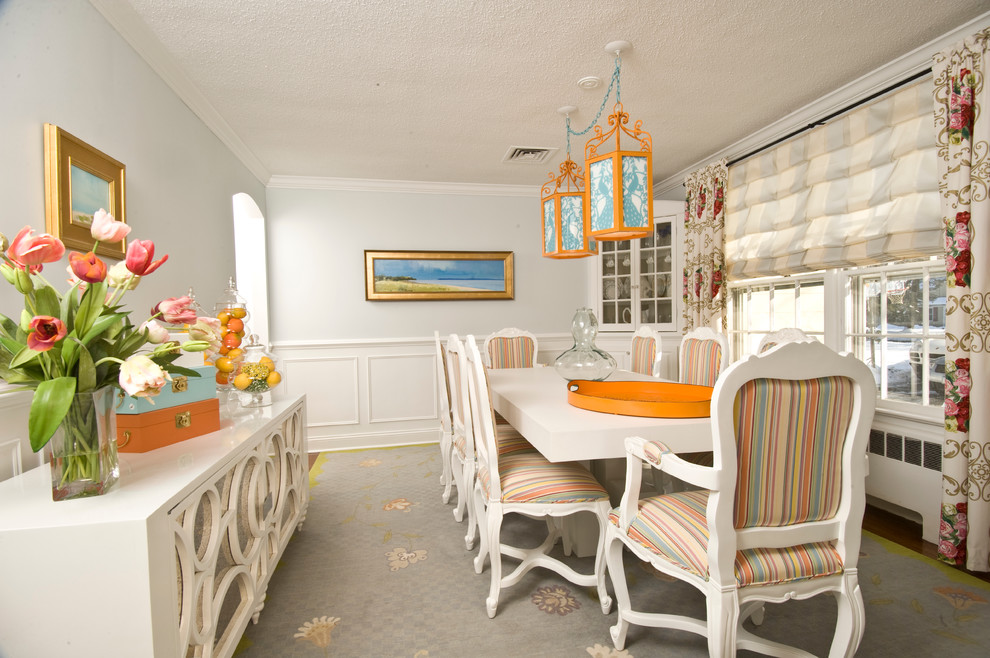 Photo of a traditional separate dining room in Other with white walls.