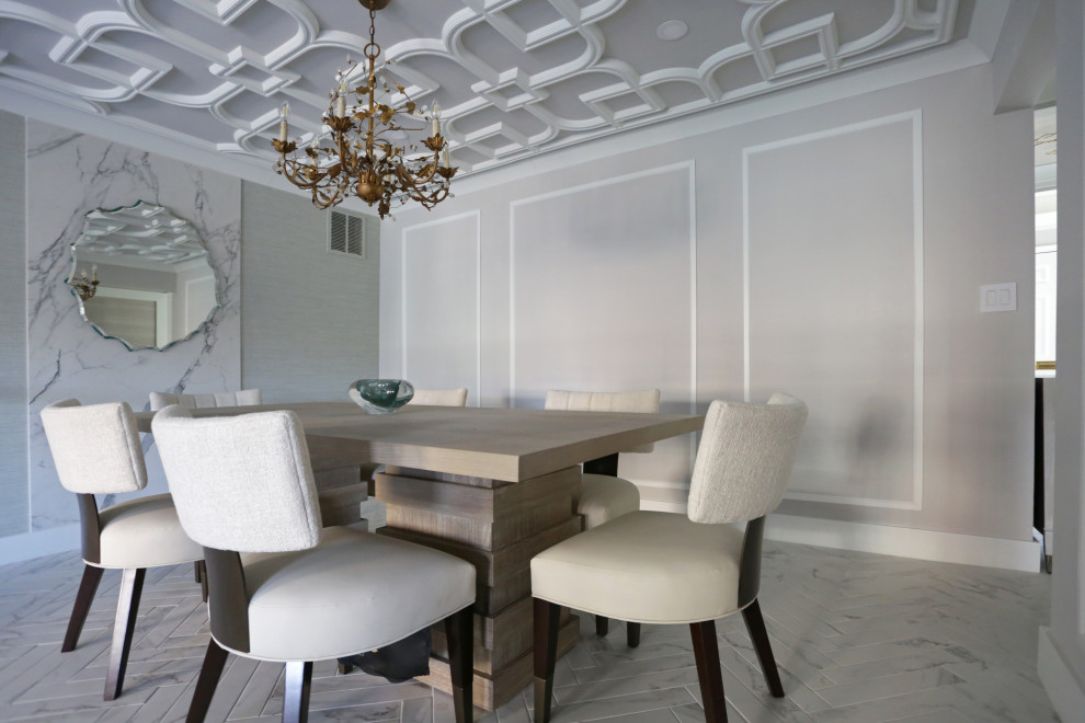 Inspiration for a mid-sized transitional l-shaped marble floor kitchen remodel in DC Metro with an undermount sink, shaker cabinets, white cabinets, quartzite countertops, white backsplash, quartz backsplash and stainless steel appliances
