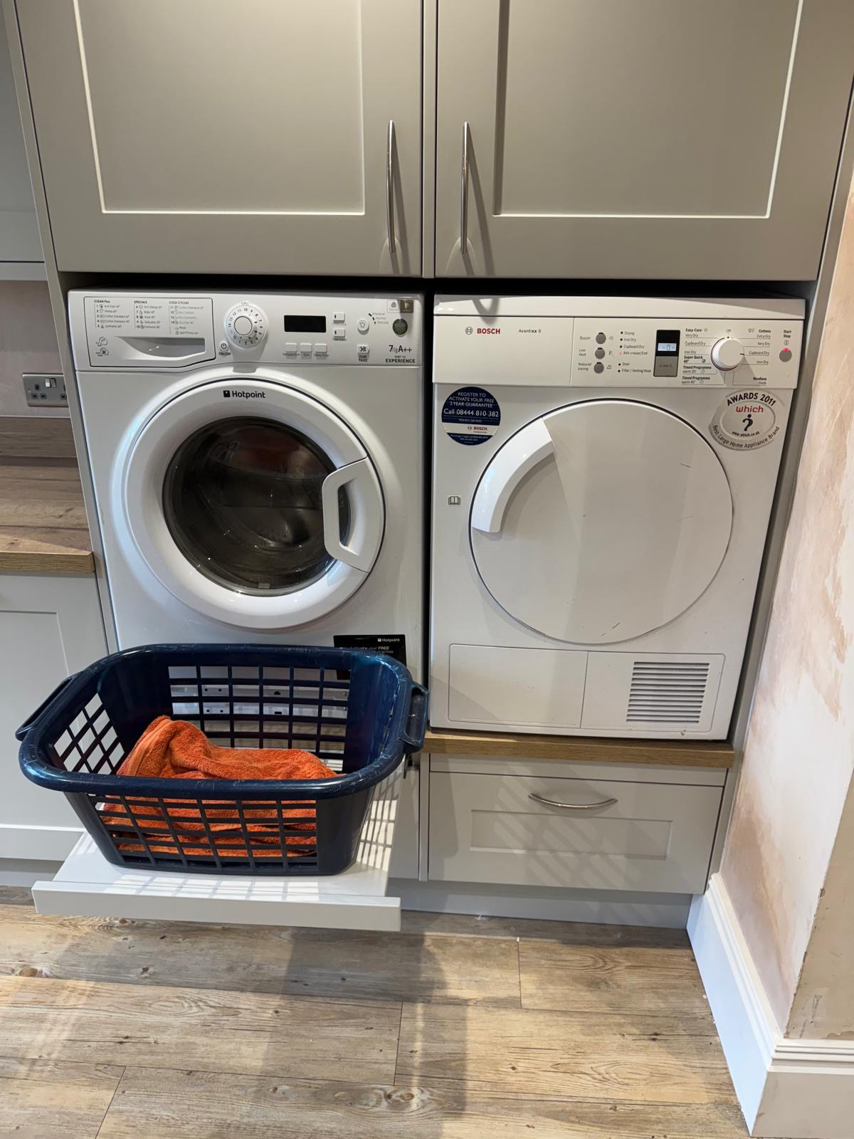 Raised washing machine and dryer.