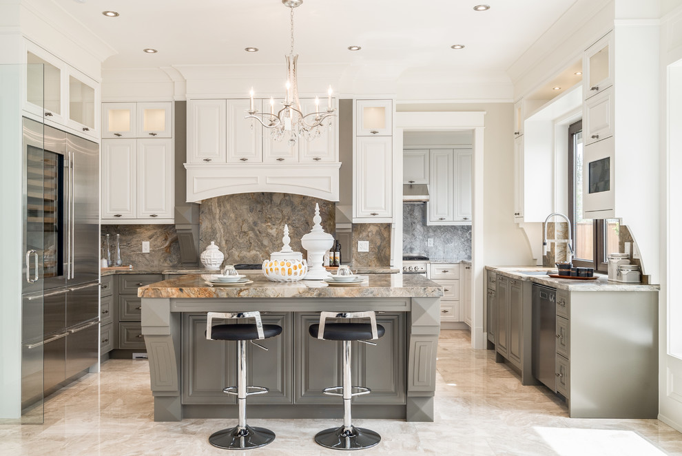 Design ideas for a mid-sized transitional u-shaped kitchen in Vancouver with raised-panel cabinets, white cabinets, marble benchtops, stone slab splashback, stainless steel appliances, marble floors, with island and beige floor.