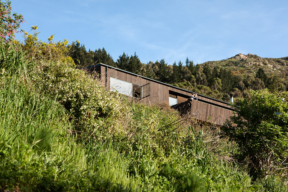 This is an example of a contemporary two-storey exterior in Christchurch with wood siding.