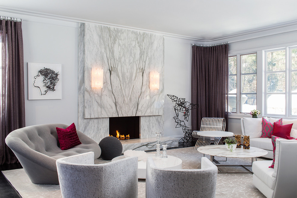 Inspiration for a contemporary living room in Boston with a standard fireplace and a stone fireplace surround.