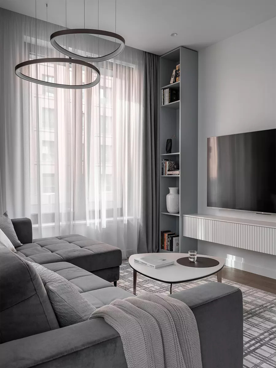 Лаконичный интерьер квартиры с коврами ручной работы