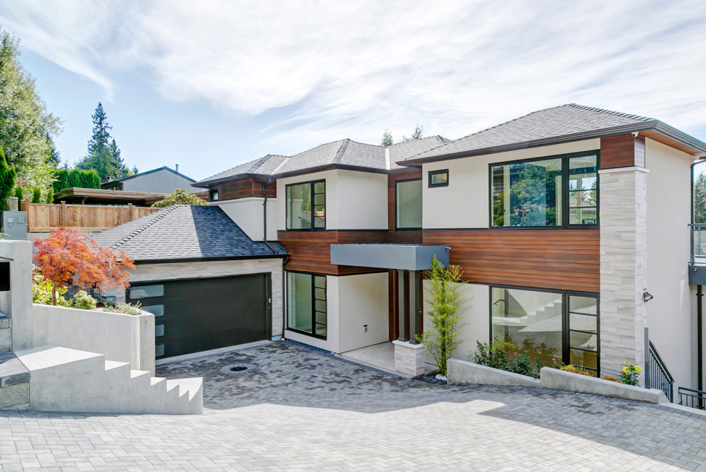 Design ideas for a contemporary house exterior in Vancouver.