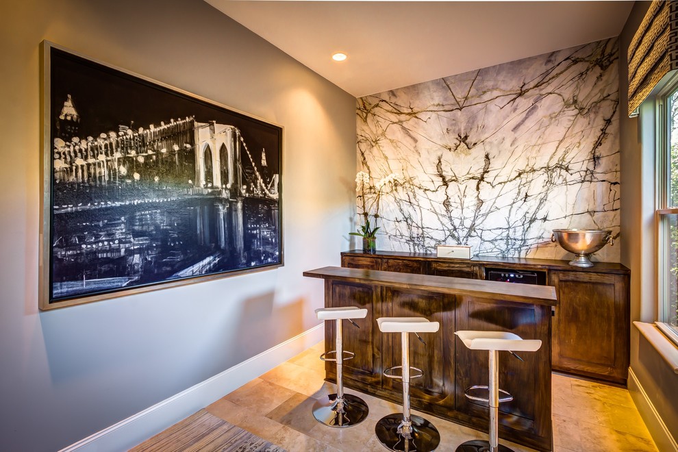 Mid-sized contemporary single-wall seated home bar in Houston with stone slab splashback, shaker cabinets, medium wood cabinets, wood benchtops, white splashback and travertine floors.