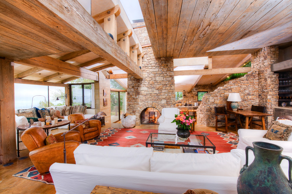 Big Sur Coast Ridge Estate - Breathtaking views of the incomparable Big Sur Coast, this classic Tuscan design of an Italian farmhouse, combined with a modern approach creates an ambiance of relaxed sophistication for this magnificent 95.73-acre, private coastal estate on California’s Coastal Ridge. Five-bedroom, 5.5-bath, 7,030 sq. ft. main house, and 864 sq. ft. caretaker house over 864 sq. ft. of garage and laundry facility. Commanding a ridge above the Pacific Ocean and Post Ranch Inn, this spectacular property has sweeping views of the California coastline and surrounding hills. “It’s as if a contemporary house were overlaid on a Tuscan farm-house ruin,” says decorator Craig Wright who created the interiors. The main residence was designed by renowned architect Mickey Muenning—the architect of Big Sur’s Post Ranch Inn, —who artfully combined the contemporary sensibility and the Tuscan vernacular, featuring vaulted ceilings, stained concrete floors, reclaimed Tuscan wood beams, antique Italian roof tiles and a stone tower. Beautifully designed for indoor/outdoor living; the grounds offer a plethora of comfortable and inviting places to lounge and enjoy the stunning views. No expense was spared in the construction of this exquisite estate.