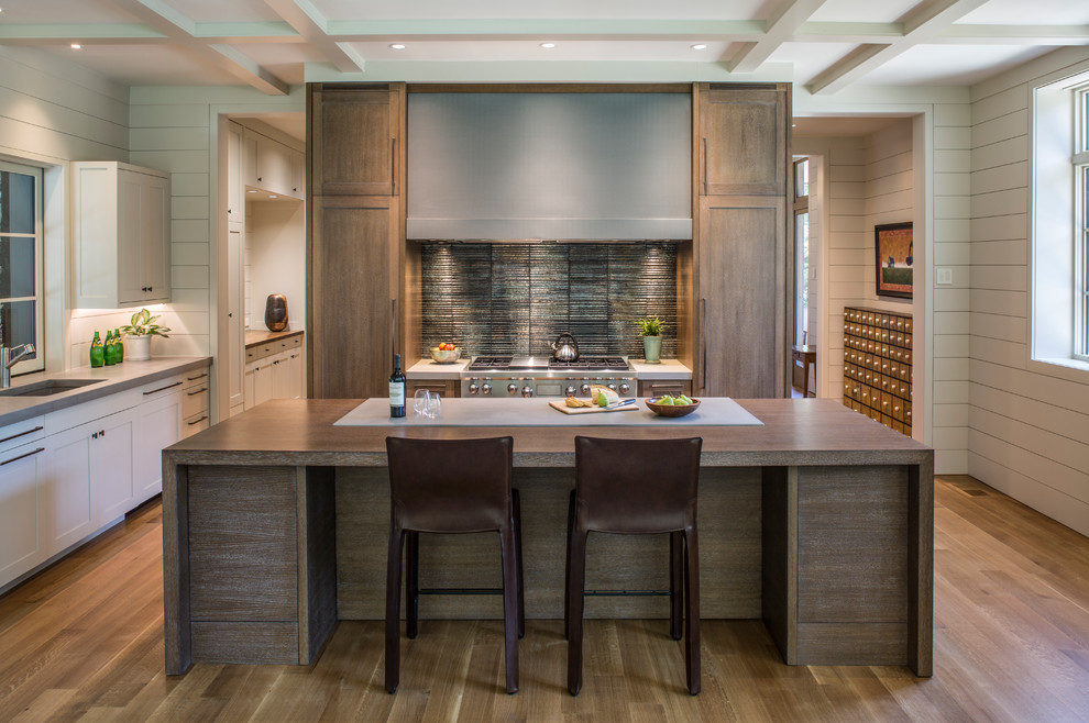 Kitchen - transitional medium tone wood floor and brown floor kitchen idea with an undermount sink, shaker cabinets, medium tone wood cabinets, wood countertops, stainless steel appliances, an island and brown countertops