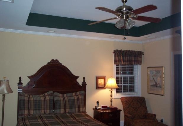 Bedroom - mid-sized guest bedroom idea with beige walls