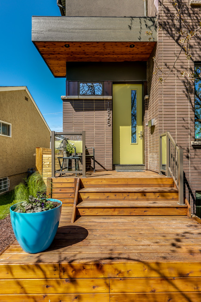 This is an example of a mid-sized midcentury entryway in Calgary.