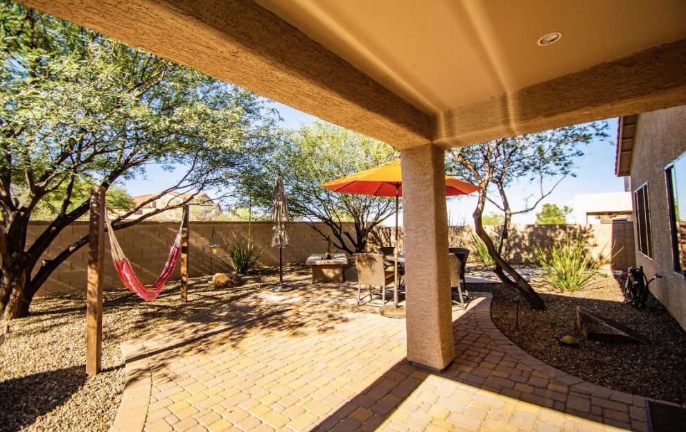Example of a small mountain style home design design in Phoenix