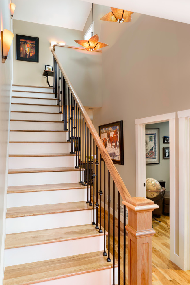 Example of a huge arts and crafts staircase design in Denver