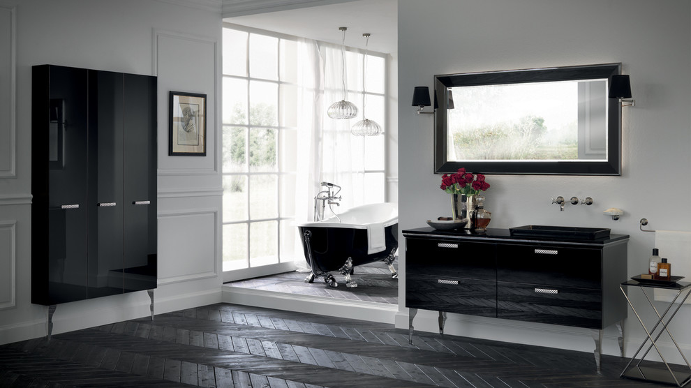 This is an example of a large master bathroom in Melbourne with a drop-in sink, raised-panel cabinets, black cabinets, granite benchtops, a claw-foot tub and dark hardwood floors.