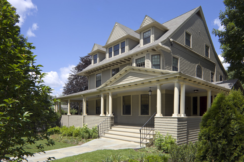 This is an example of a traditional exterior in Boston with wood siding.
