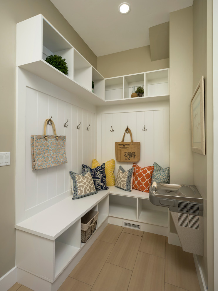 Inspiration for a small country mudroom in Salt Lake City with beige walls.