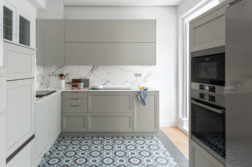 Inspiration for a large contemporary l-shaped eat-in kitchen in Other with raised-panel cabinets, grey cabinets, marble benchtops, white splashback, marble splashback, stainless steel appliances, multi-coloured floor, white benchtop, a single-bowl sink, ceramic floors and with island.