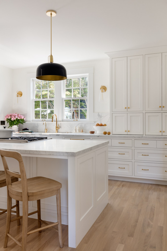 Example of a transitional kitchen design in Seattle