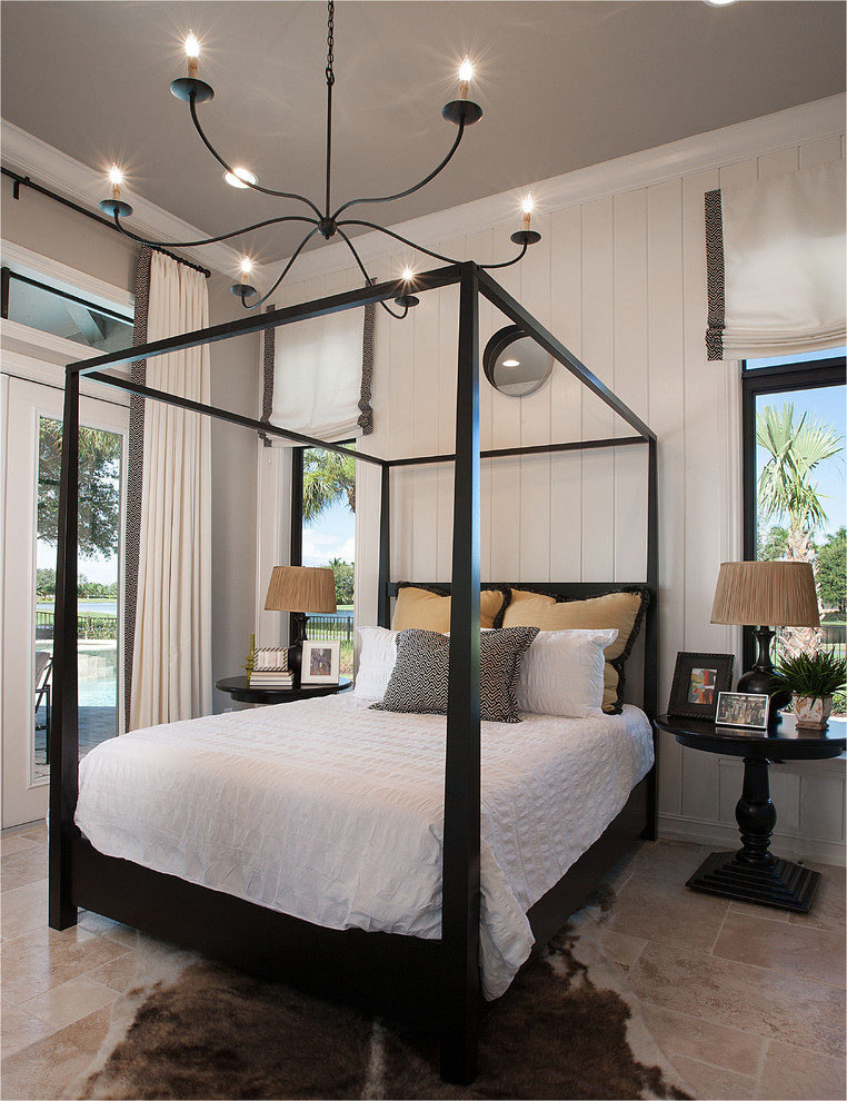Traditional master bedroom in Miami with white walls.
