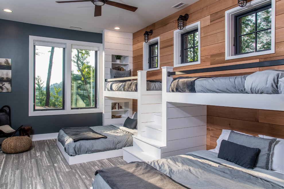 Organic Modern Mountain Home - A rustic kids' room designed for ages 4 to 10, featuring cozy double deck beds, soft gray carpet flooring, and a warm, playful ambiance. This functional and eco-friendly space is part of the sustainable organic modern mountain home.