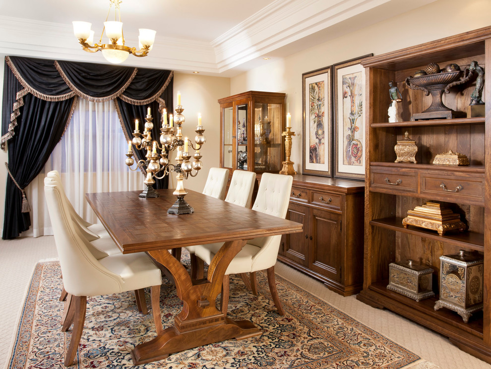 Large traditional open plan dining in Sydney with beige walls and carpet.