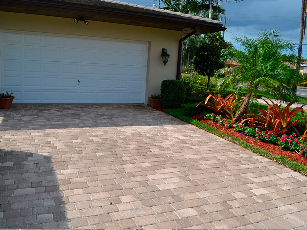 Inspiration for a rustic brick floor front door remodel in Miami