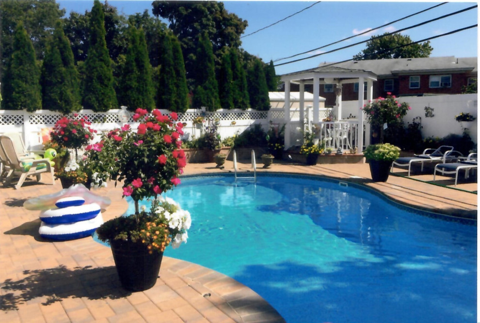 Pool with Whirl pool spill over, outdoor kitchen, outdoor bar, Pergola& Patio