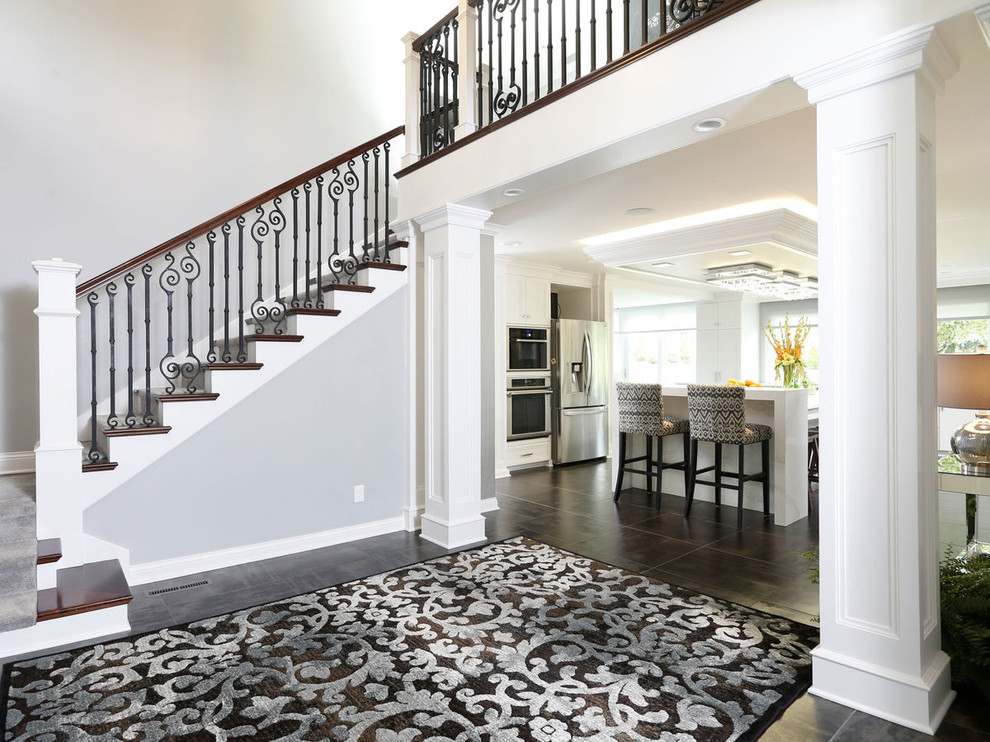 Transitional staircase photo in Cedar Rapids