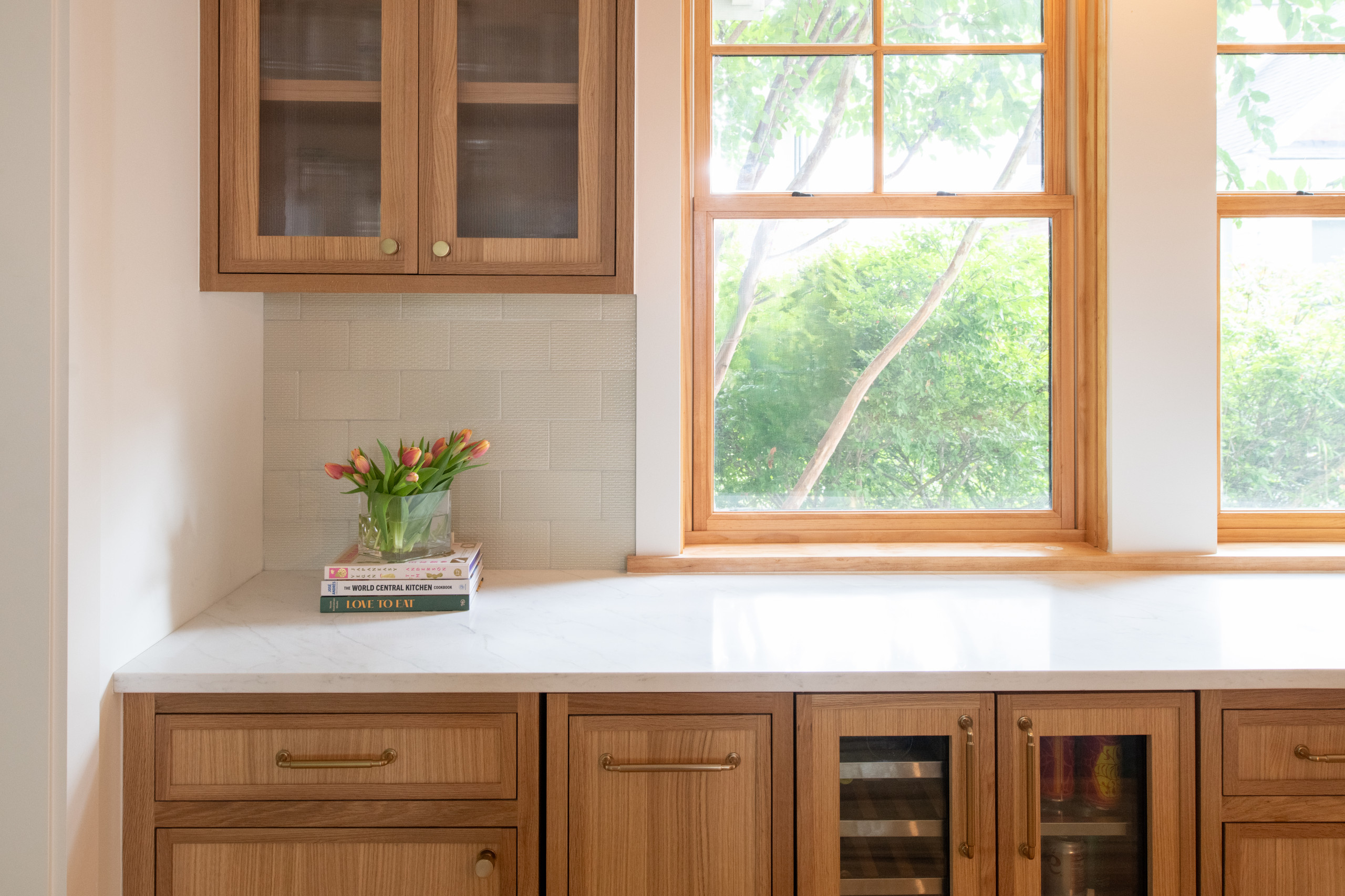 Warm Modern Kitchen Renovation with Natural Oak & Green Accents