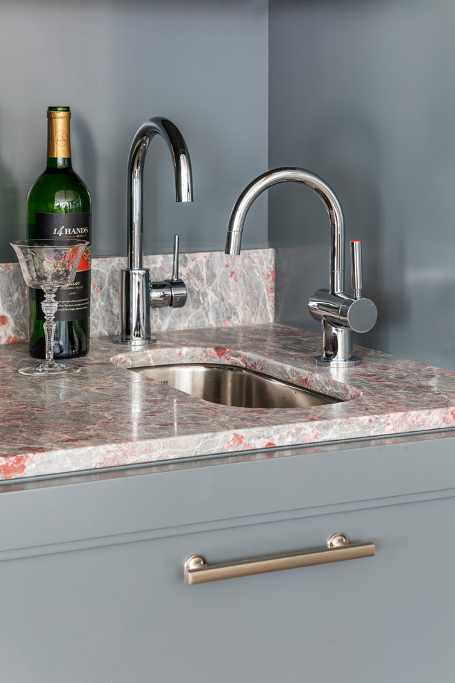 Inspiration for a small transitional wet bar in Boston with recessed-panel cabinets, grey cabinets and quartzite benchtops.