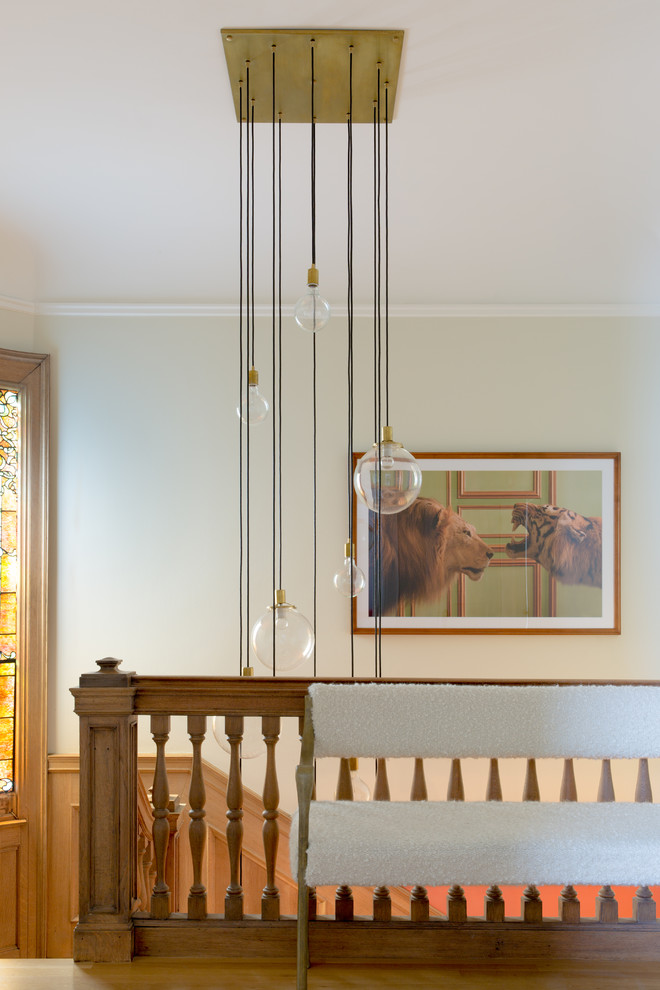 Design ideas for a transitional staircase in San Francisco with wood railing.