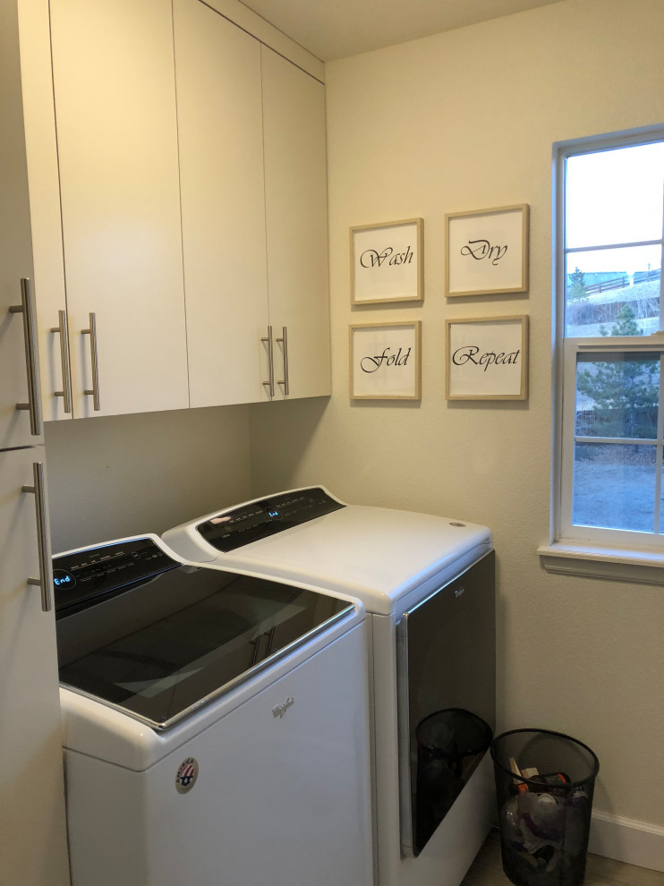 Transitional laundry room photo in Denver