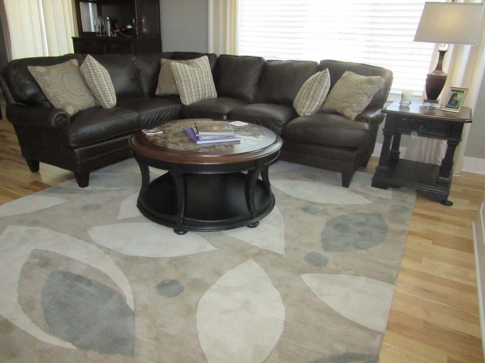 Home design - mid-sized transitional open concept light wood floor home design idea in Omaha with gray walls