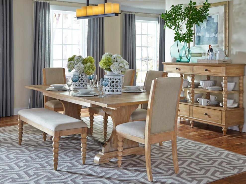 Example of a large medium tone wood floor great room design with beige walls