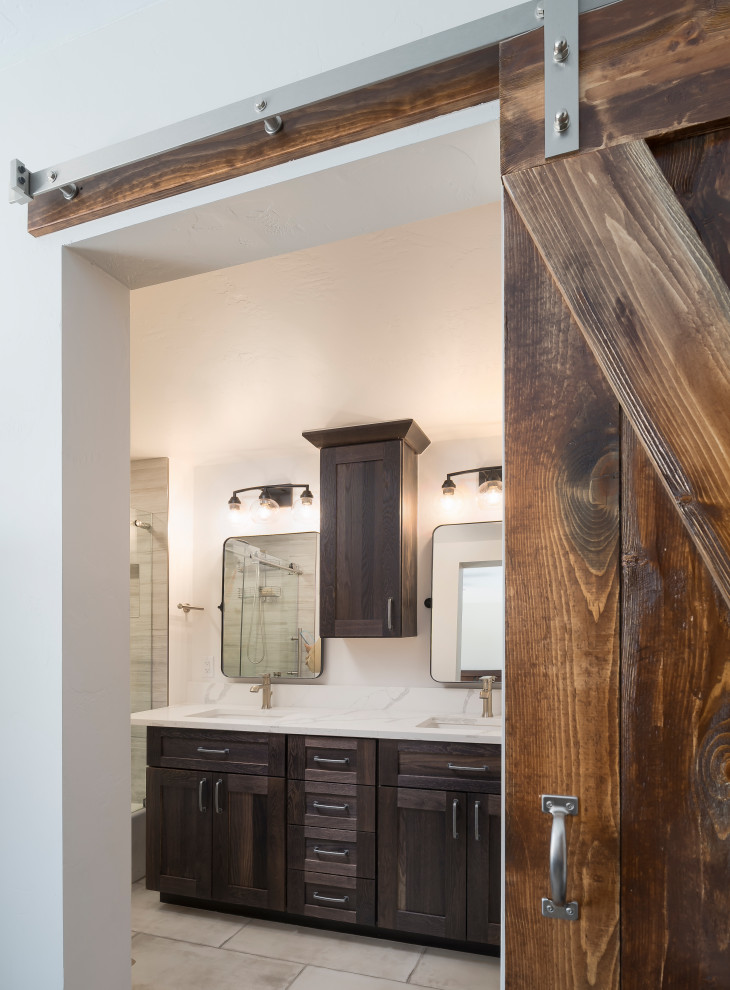 Photo of a mid-sized contemporary master bathroom in Denver with shaker cabinets, dark wood cabinets, a double vanity and a built-in vanity.