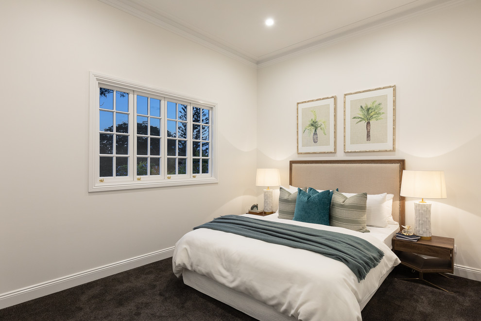 Transitional bedroom in Brisbane with white walls, carpet and black floor.