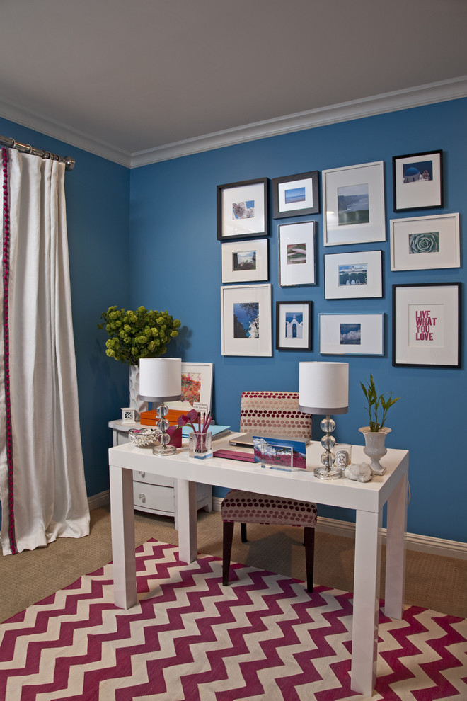 This is an example of a traditional home office in Los Angeles with blue walls.