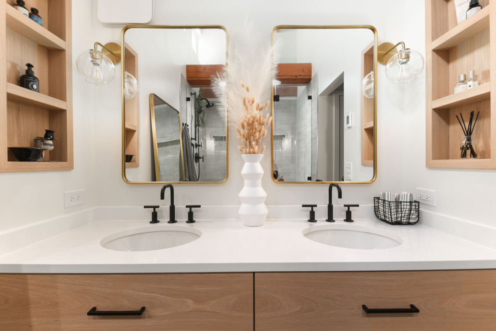 Medium sized modern ensuite bathroom in Chicago with flat-panel cabinets, light wood cabinets, porcelain flooring, quartz worktops, blue floors, white worktops, double sinks, a built in vanity unit and exposed beams.