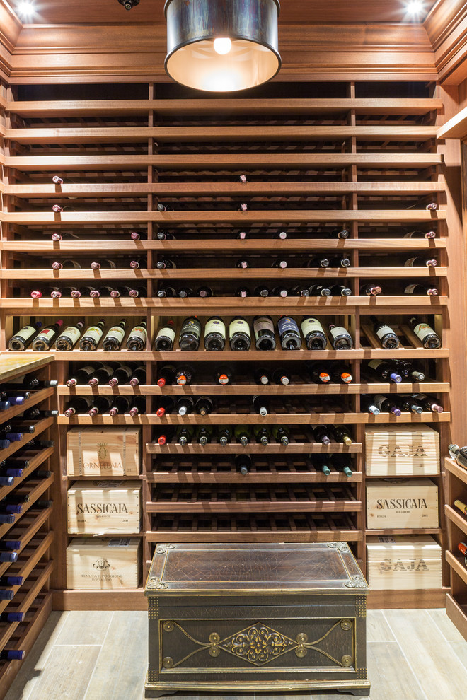 Photo of a large traditional wine cellar in New York.