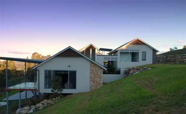 Photo of a mid-sized contemporary home design in Sydney.
