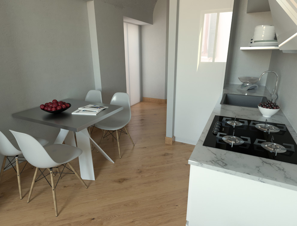 Small mediterranean l-shaped open plan kitchen in Turin with a drop-in sink, open cabinets, white cabinets, marble benchtops, white splashback, stainless steel appliances, light hardwood floors, no island, beige floor and white benchtop.