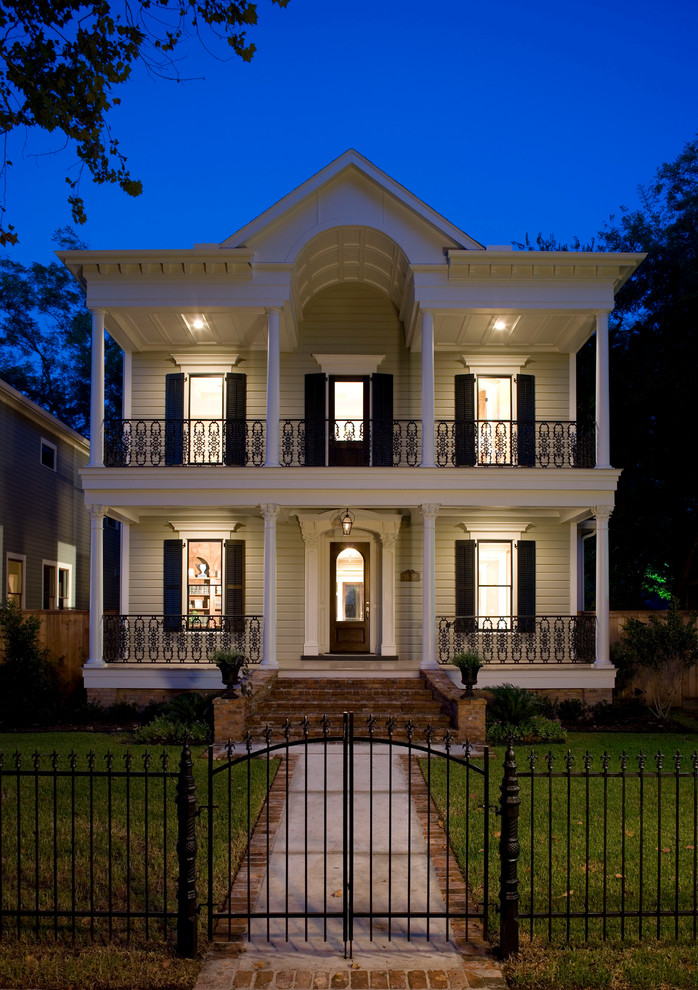 Inspiration for an expansive traditional two-storey white house exterior in Houston.